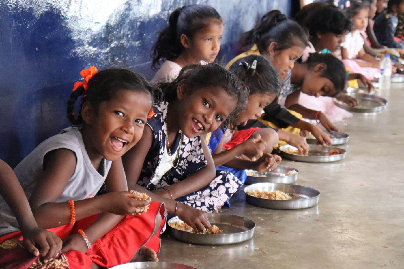 Children eating together at a centre